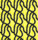 a black and yellow pattern with spikes on it
