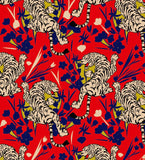 a red background with a tiger and flowers