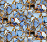 a close up of a pattern of blue and white rocks