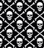 a pattern of skulls and bones on a black background