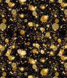 a black background with lots of gold sparkles