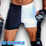 a man wearing a pair of black and white wrestling shorts